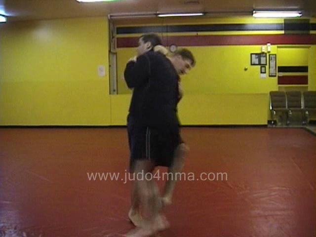 Click for a video showing a Judo for MMA technique called Okuri Ashi Harai - Assisted Ankle Sweep -  asssited ankle sweep
